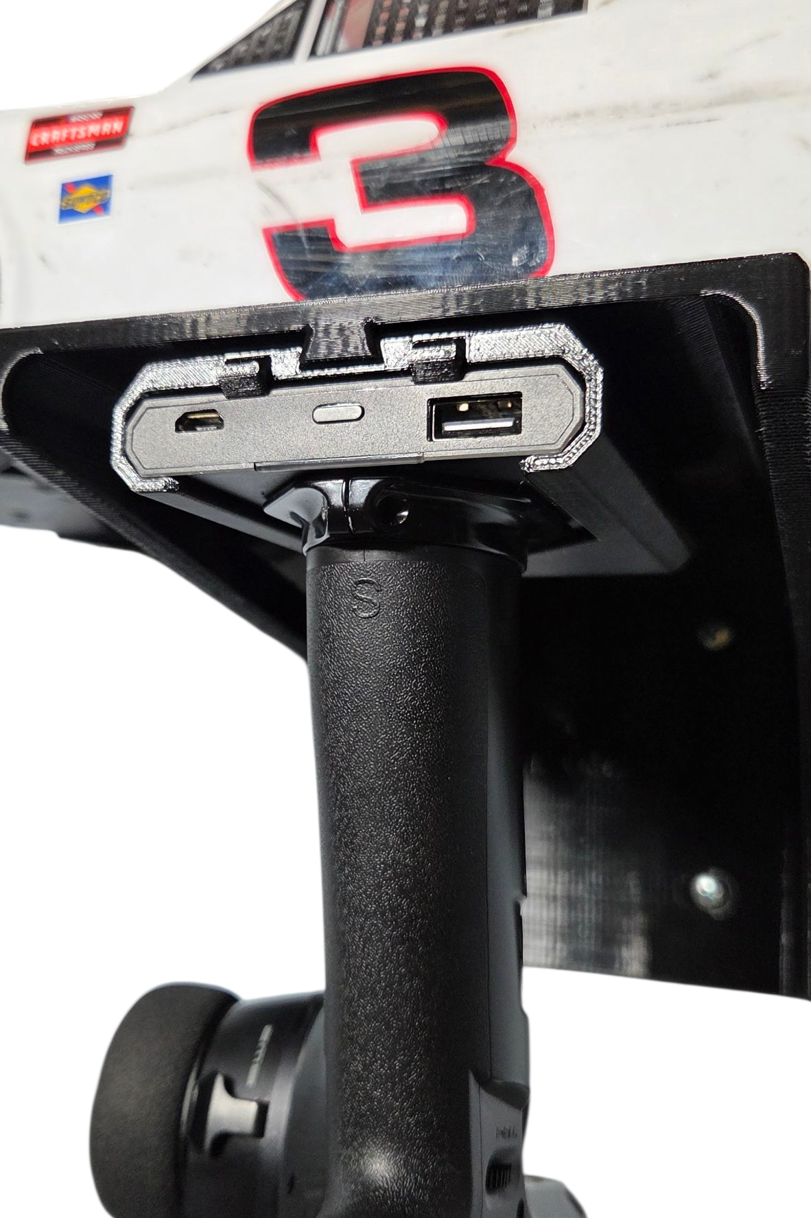 RC Wall Shelf Scale Car Holder with Dovetail Controller Mount includes a builtin dovetail track and the optional Noble NB