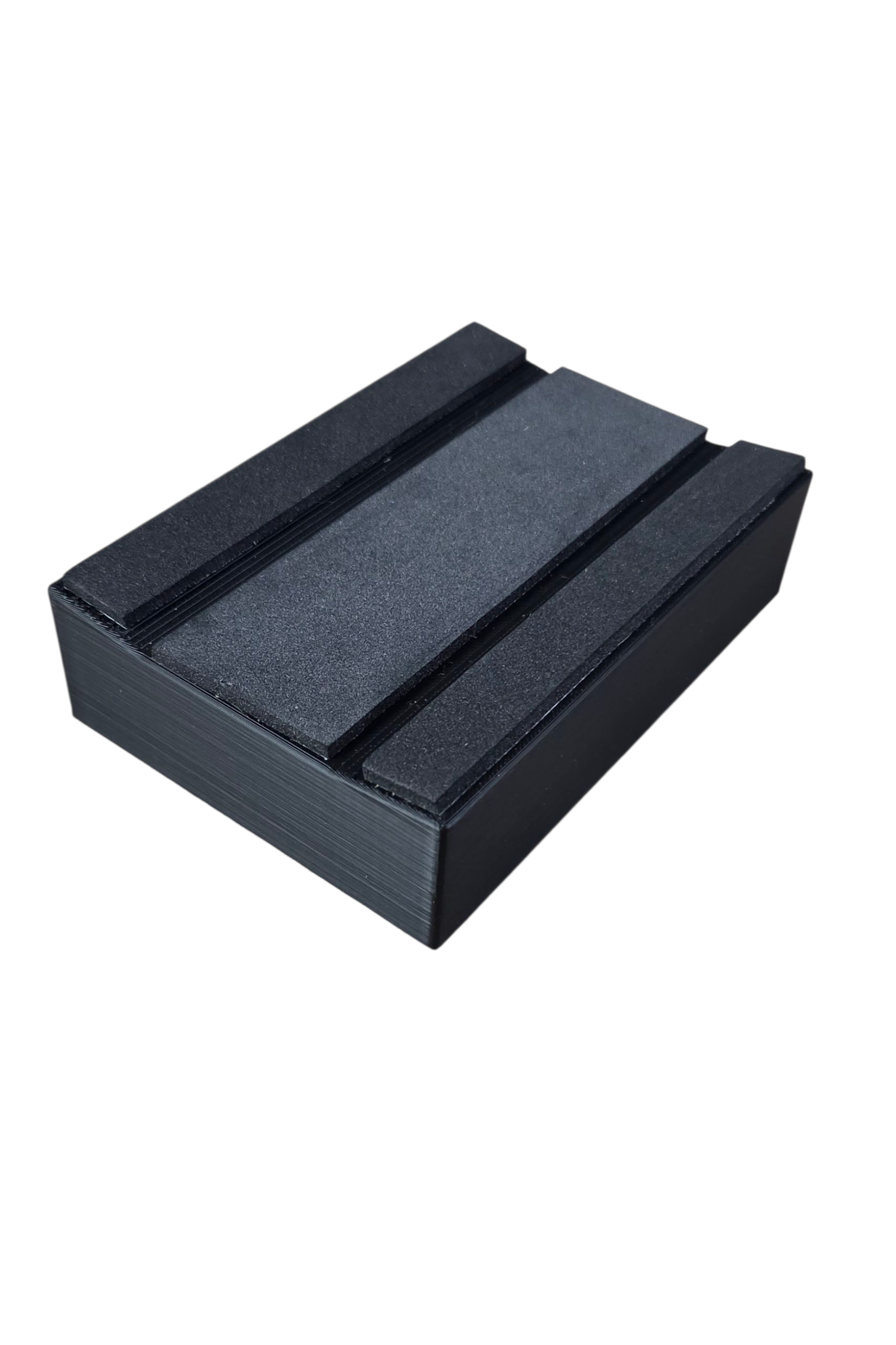 RC Stock Car Display Race Stand stand is a solid block with matching angles cut into the top to cradle the chassis and keep the